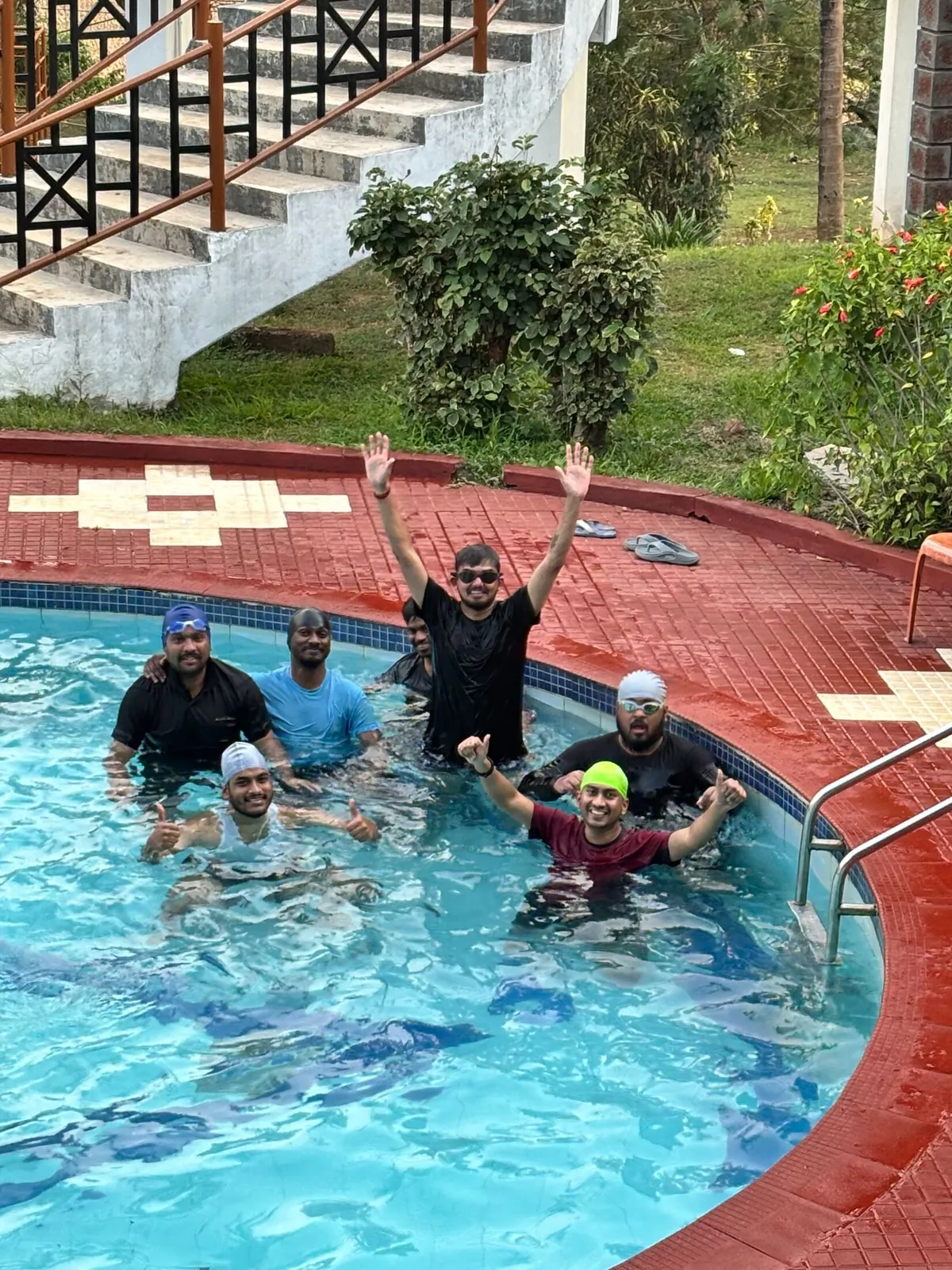The team cooling off at a pool day